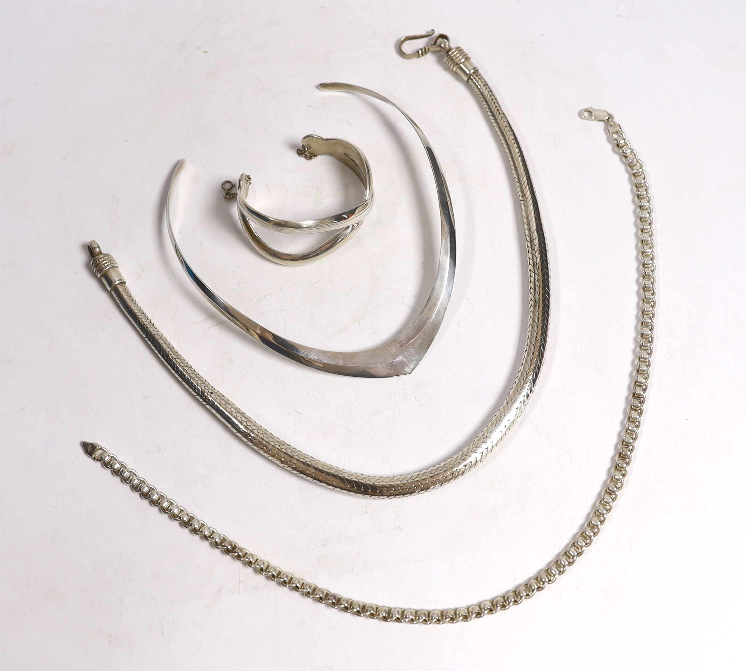 A large continental white metal snake link necklace, 44cm, a silver chain, a silver crossover bracelet and a 925 necklet.